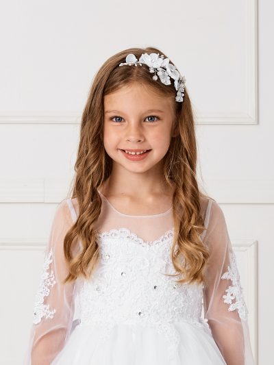 Elegant girls communion hair accessories featuring a white floral headband with crystal and pearl accents, perfect for first communion, weddings, and flower girl attire.