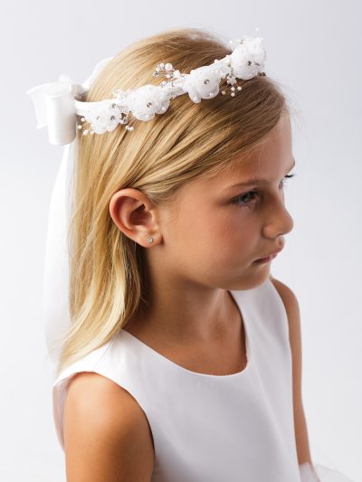 Girls Communion Flower Crown with white flowers, crystals, and ribbon bow.
